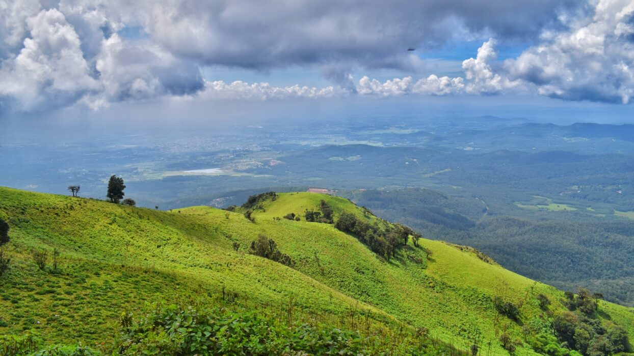 Lush green hill valleys — team exploration and scenic networking in hill-station settings
